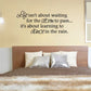 Inspirational wall decal with script quote: Life isn't about waiting for the storm