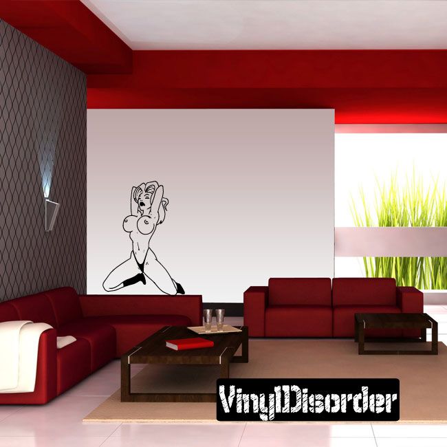 Vinyl decal of light-haired topless dancer, black outline with raised arms