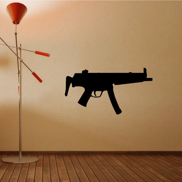 Black submachine gun wall decal silhouette, shaped as a toy weapon