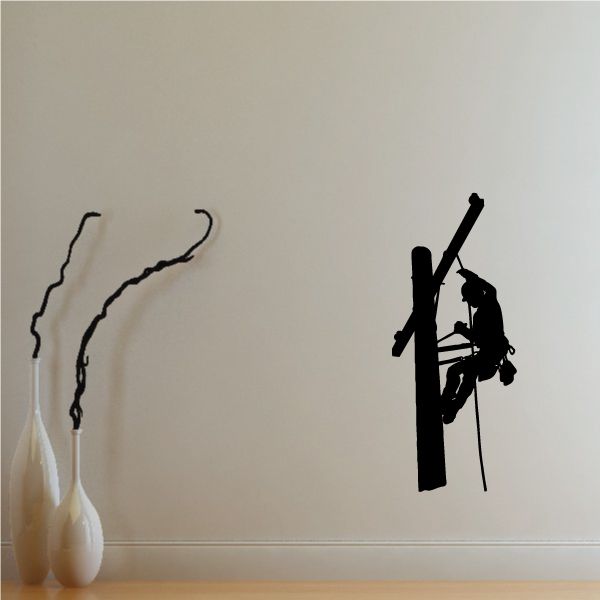 Black lineman wall decal with tool and pole silhouette, vinyl style