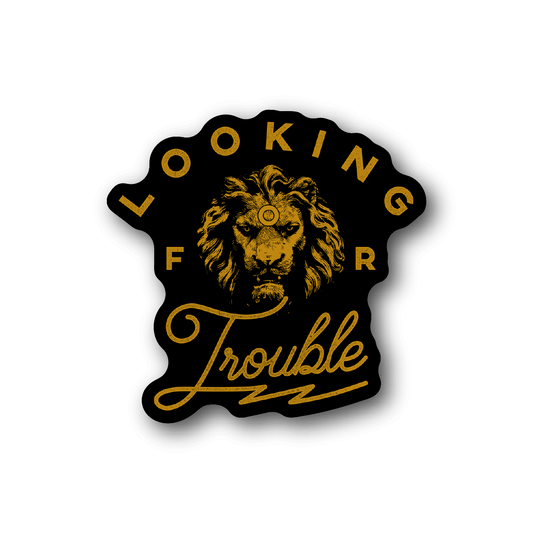 Vinyl sticker with roaring lion head and gold 'Looking for Trouble' text
