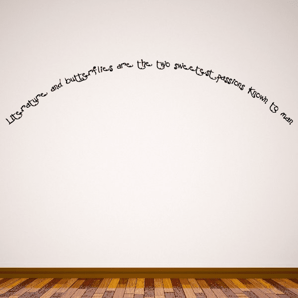 Butterfly and book-themed wall decal with curved black script quote