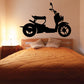 Black scooter wall decal with rider silhouette and detailed wheels