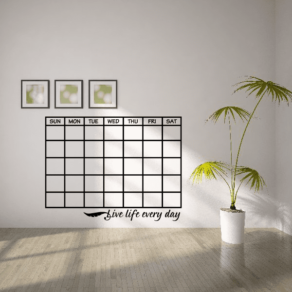 Monthly calendar wall decal with grid, day labels, and "Live life every day" slogan.
