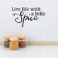 Black script wall decal reading 'Live life with a little Spice'