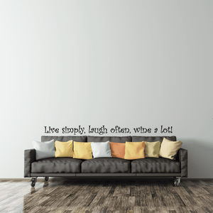 Wall decal with quote: "Live simply, laugh often, wine a lot!"