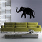 Walking elephant decal with black silhouette, raised trunk and lifted legs