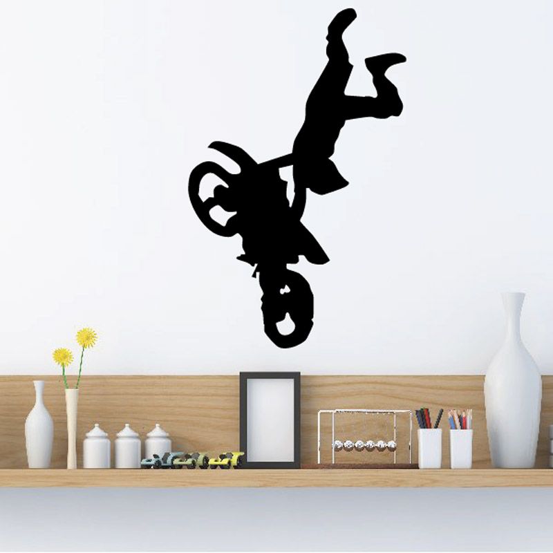 Dirt bike rider look-back wall decal, black silhouette on motorcycle