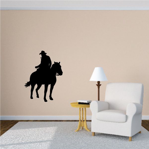 Image of Looking Back Cowboy Riding Horse Decal