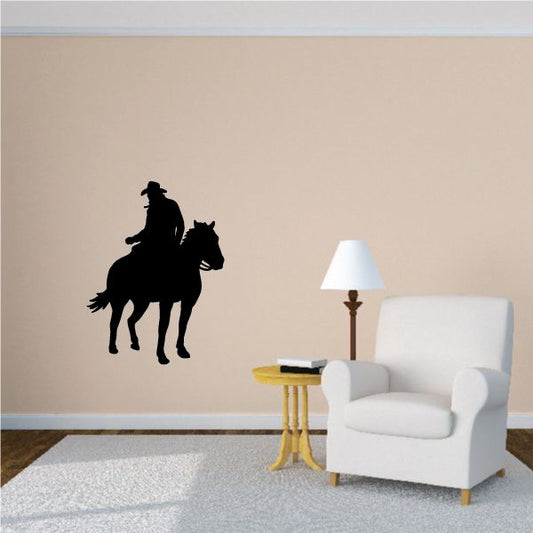 Image of Looking Back Cowboy Riding Horse Decal