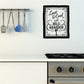 Square wall decal, black border with white quote: Love & Cook with Wild Abandon