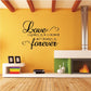 Love wall decal with cursive text and small heart-like flourishes