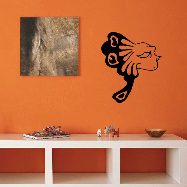 Mask decal with lion face silhouette and masquerade mask outline