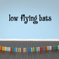Low Flying bats quote wall decal with black bats lettering