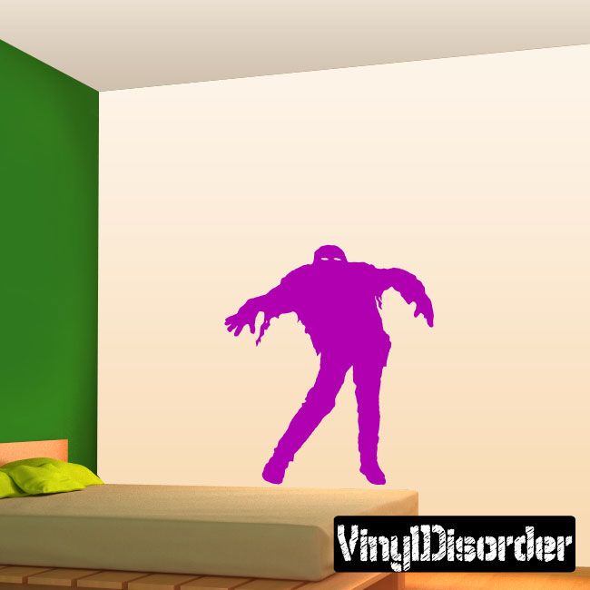 Lunging zombie wall decal, purple silhouette with outstretched arms and legs.