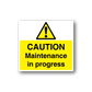 Maintenance in progress caution sticker with yellow triangle and bold 'CAUTION' text