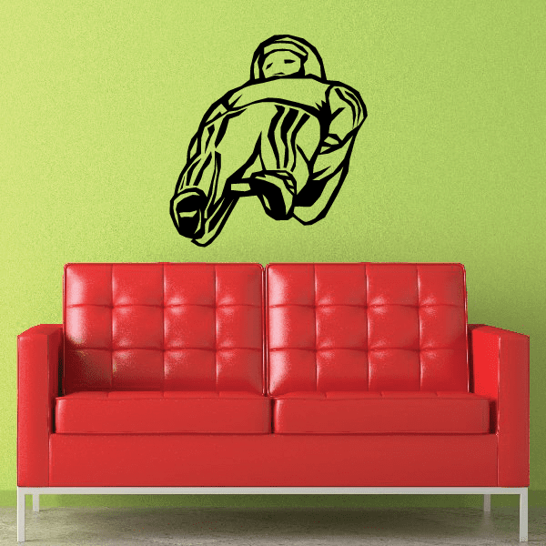 Male luge rider decal: green line art of a sliding athlete in a cap and gloves.