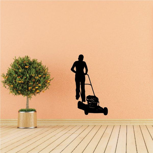 Image of Male Mowing Lawn Decal