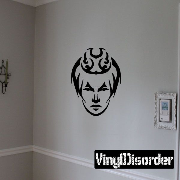 Black tribal face decal with flame hair and bold outlined features