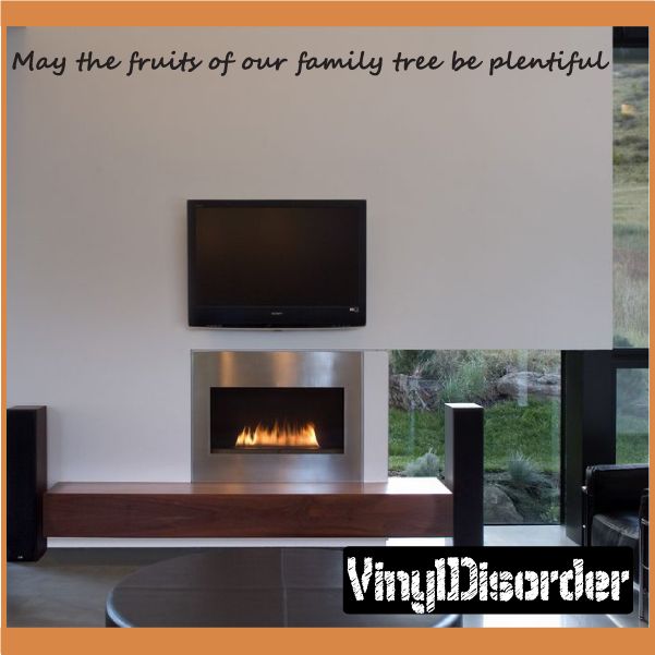 Wall decal with cursive text: “May the fruits of our family tree be plentiful”