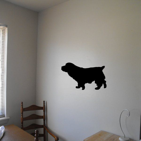 Maya dog decal in black, dog silhouette shape