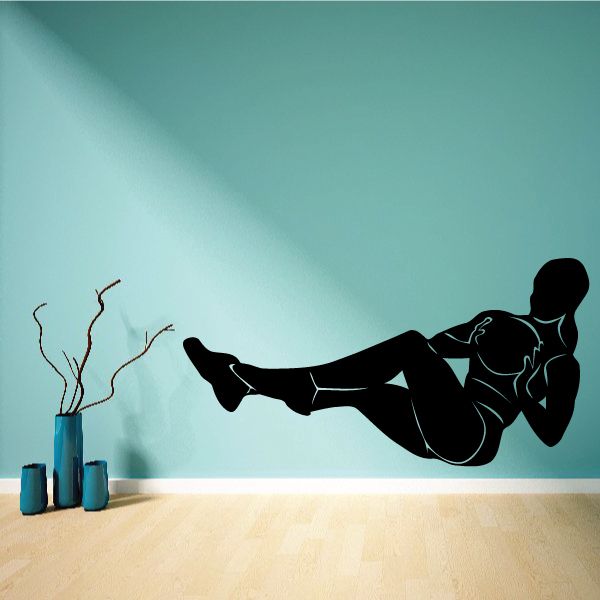 Fitness wall decal of black silhouette doing medicine ball exercise