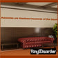 Wall decal with red quote text: "Memories are timeless treasures of the heart"