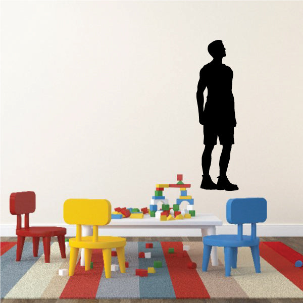 Wall decal of a full-body man standing in profile pose