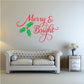 Holly printed wall decal with 'Merry & Bright' text in red and green