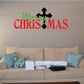 Christmas decal with “Merry Christmas” lettering and black cross icon accents