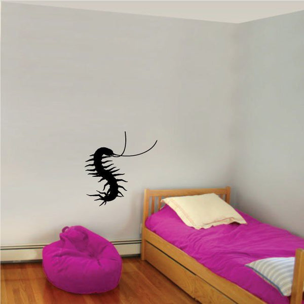 Black millipede curving wall decal with long antennae
