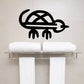 Turtle symbol decal in black minimal line art with shell and flippers