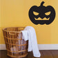 Minimalist jack-o-lantern wall decal, black carved face