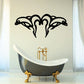 Mirrored dolphin splash decal with black outline and central splash shape