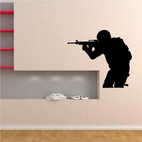 Shooting soldier wall decal with dark silhouette and rifle, removable vinyl sticker