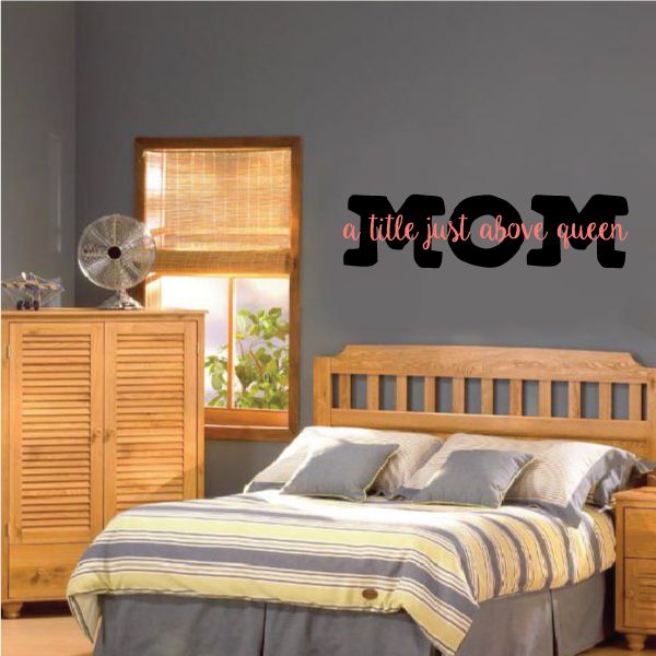 Black wall decal with cursive text, 'a little just above queen'