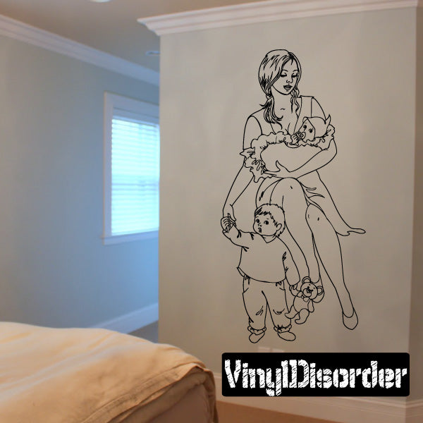 Mom-and-baby wall decal featuring a woman holding a baby and standing with a child