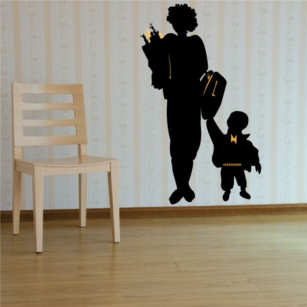 Silhouette sticker of mom holding grocery bag and child with backpack