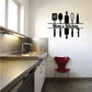 Kitchen utensils wall decal with Mom's Kitchen text and black fork, spoon, whisk icons