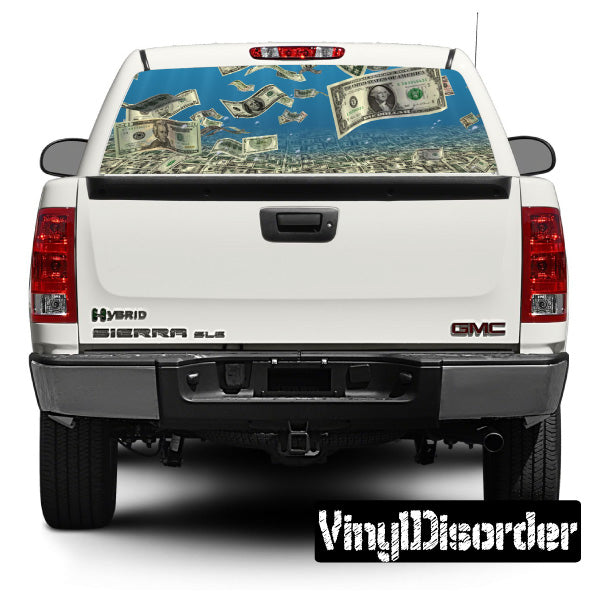 Car rear window view with money graphic decals