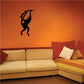 Monkey swinging on branch wall decal, black silhouette