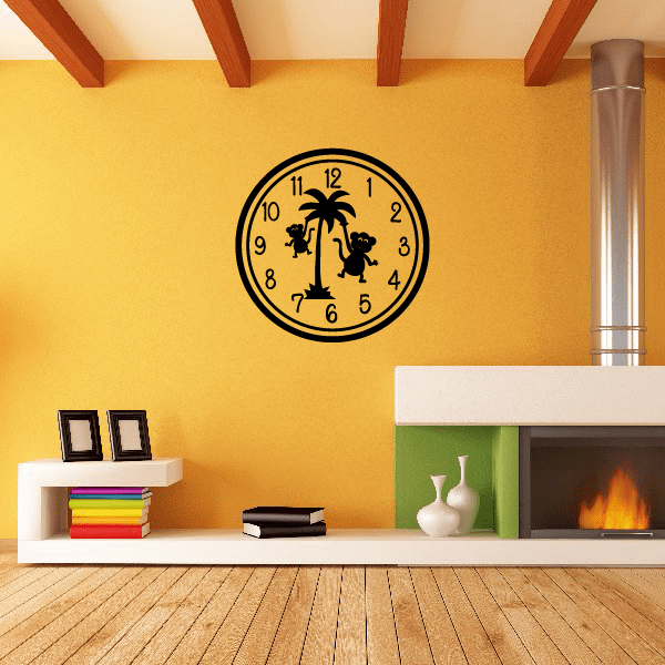 Clock face wall decal with black border and two monkey silhouettes