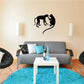 Monkeys grooming wall decal with black silhouette of a monkey caring for another