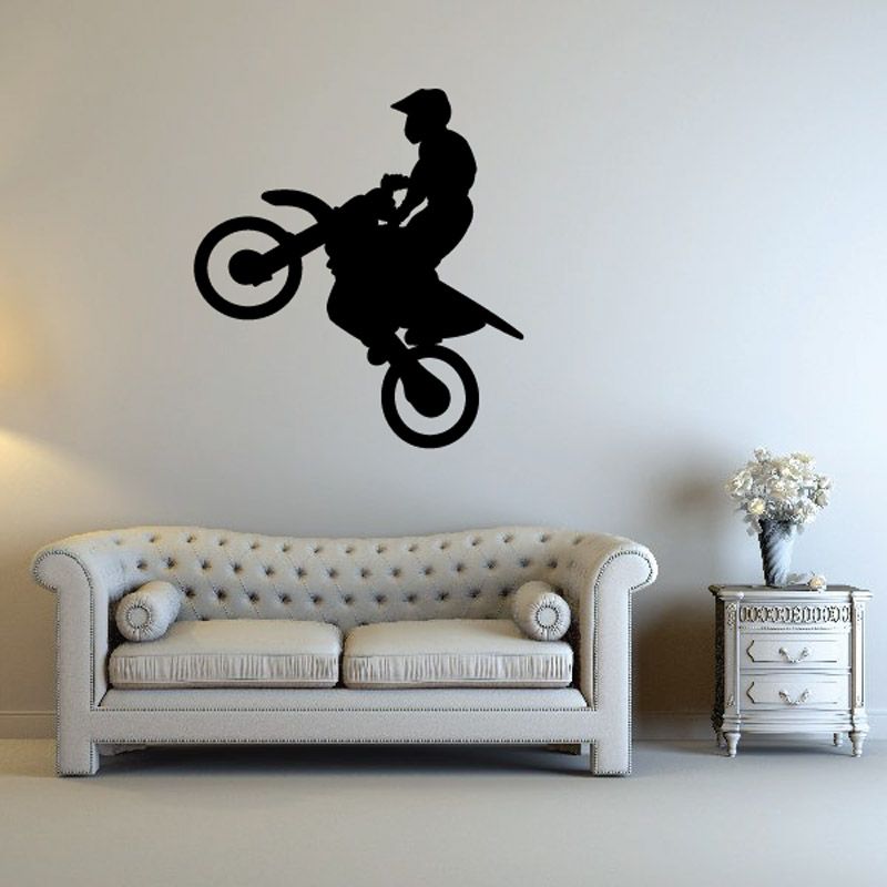 Dirt bike jump rider decal in black with circular wheels silhouette
