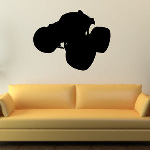 Monster truck wall decal, black vinyl silhouette on a wall