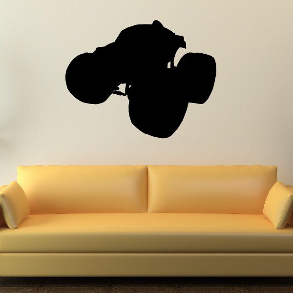Monster truck wall decal, black vinyl silhouette on a wall