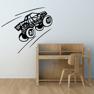 Monster truck wall decal, black vinyl design with large wheels and motion lines