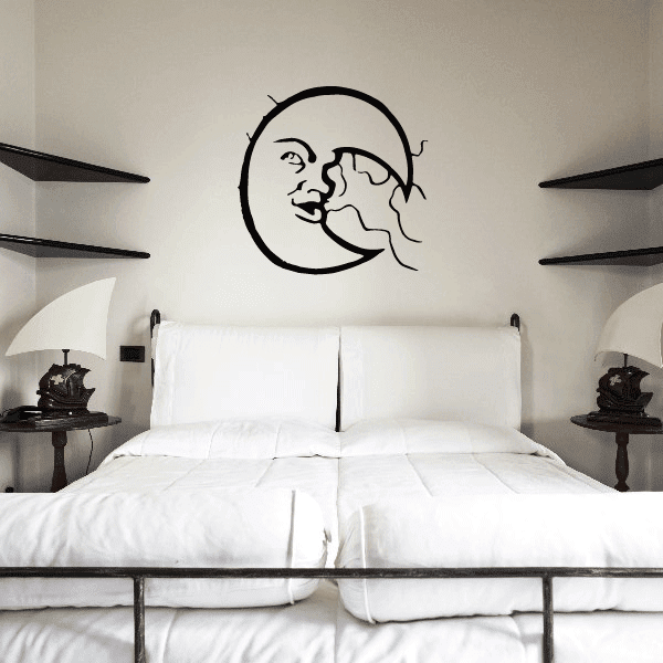 Black line-art moon and clouds wall decal, round face with flowing cloud stream