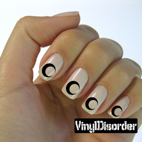 Moons fingernail art stickers with black crescent moon decals on white nails