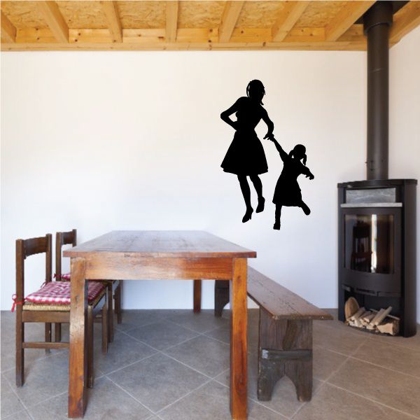Mother and daughter silhouette wall decal, holding hands, skipping in dress and skirt